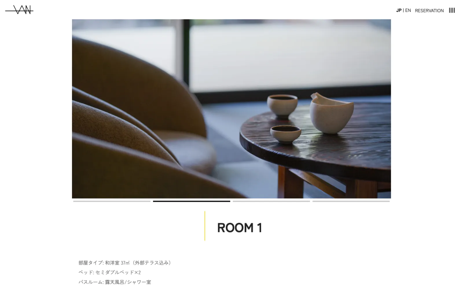 ROOM 1 detail page — a still-life shot of a cup and bowl on a low table, with a thin VAN wordmark and a centered ROOM 1 label.